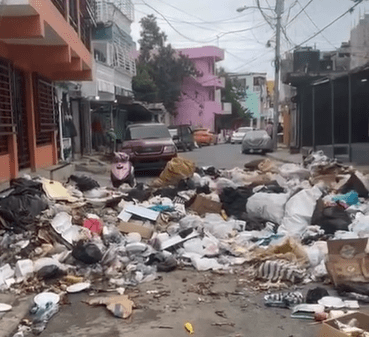 Denuncian vertedero improvisado y cúmulo de basura en avenida principal Guajimía en SDO